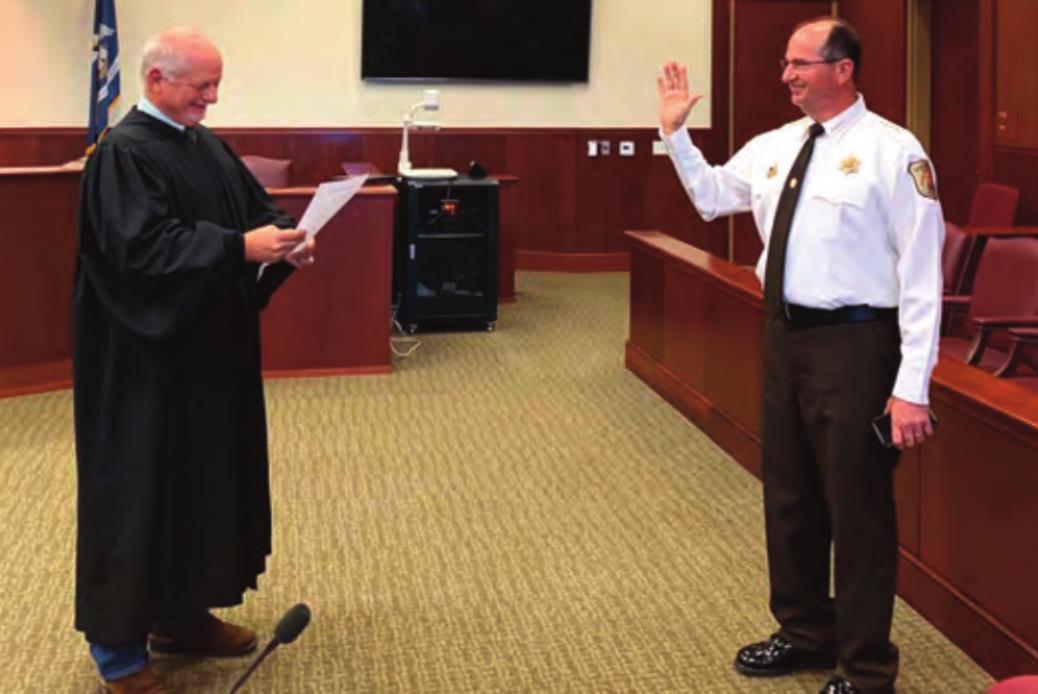 Twenty-third Judicial Judge Tommy Kliebert administers the Oath of Office to St. James Parish Sheriff Willy Martin, Jr. Sheriff Martin now begins his 8th consecutive term and he and Lafourche Parish Sheriff Craig Webre are the longest tenured Sheriffs in