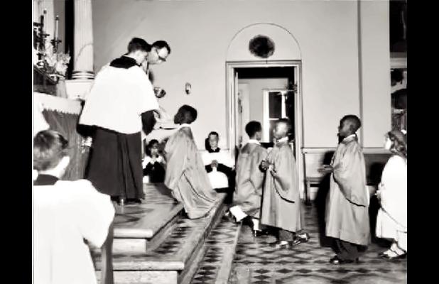 Communion at St. James Catholic Church in 1955.