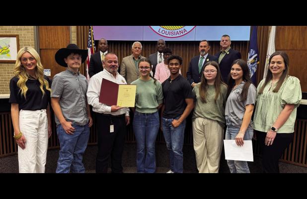 Representatives with the LSU AgCenter and members of the 4-H Youth Development program attended the most recent St. James Council meeting. Here they are taking a photo with Parish President Pete Dufresne and the Parish Council.