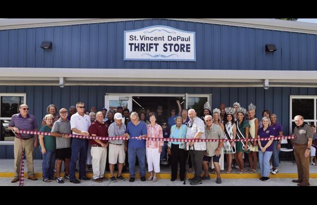 A big crowd turned out to help cut the ribbon to officially open the new St. Vincent DePaul Thrift Store in Lutcher (1889 W. Main St., Lutcher, LA). The brand new building was built after the former building was damaged and condemned due to damage sustain