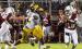 St. James Wildcat senior defenders Myron Jasmin (linebacker) and I’Xavier Anderson (defensive lineman) pressure the Dunham quarterback during last Friday’s 12-7 victory. With the win the Wildcats remained unbeaten (4-0) for the season.