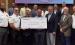 ExxonMobil representative Michael Smith and other company officials presented a $66,000 check to the St. James Parish Council last week representing the cost of hand-held carbon dioxide monitors to be used by the St. James Parish Sheriff's Office. The mon