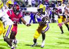 The Lutcher Bulldog freshman quarterback Terron Charles ran 12 times for 105-yards and a TD in last Thursday’s 27-20 win over Liberty. Photo by Tony Schexnayder The Lutcher Bulldog freshman quarterback Terron Charles ran 12 times for 105-yards and a TD in last Thursday’s 27-20 win over Liberty. Photo by Tony Schexnayder