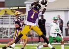 Lutcher Bulldog receiver/defensive back Ashton Stark had a game of a lifetime last Friday against Slidell. Stark ran for a TD, caught two TD passes, threw a TD pass, and had two interceptions. Photo by Tony Schexnayder
