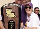 Bulldog Head Coach Ryan Jensen and his wife Natalie take a turn with the trophy.