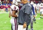 Coach Valdez shaking hands and consoling a Jennings High player after the 2019 State Championship game. St. James beat Jennings 51-14 to win the school’s first State Championship since 1979. Photo by Oliver Hooker “I Loved Every Minute Of It!” Coach Valdez Says He