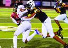St. James Wildcat Jarrell Williams makes a tackle last Friday against Assumption. Williams, who also had an interception, and the Wildcats beat Assumption 33-7. Photo by Oliver Hooker Wildcats Too Much For Tigers; Improve To 2-1 With 33-7 Win