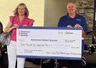 American Cancer Society representative Anne Bates accepts a $12,500 donation from Dale Hymel, Jr. The money was given by the Hymel Family / Golden Grove Truck Stop. American Cancer Society representative Anne Bates accepts a $12,500 donation from Dale Hymel, Jr. The money was given by the Hymel Family / Golden Grove Truck Stop.