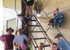 VFW And Local Scouts Place Flags On Vets Graves
