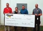 (From left) Eric Deroche, St. James Parish Director of Emergency Preparedness; Jackie McCreary, Mosaic Public Affairs Manager; Parish President Peter Dufresne and Ryan Donadieu, Assistant Director of Emergency Preparedness. Mosaic Continues Hurricane Recovery Support; Donation To Help Parish During Future Disasters