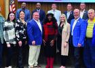 Taylor Roussel was named the St. James Parish Registrar of Voters by the St. James Parish Council during last week’s meeting. Taylor is pictured with Parish President Peter Dufresne, the members of the Parish Council, and her family. In a separate photo Dufresne Updates Parish On Projects