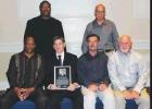 Hall of Fame Inductee James Waguespack is pictured with former St. James High football players. Seated from left are Stephen Allen, Jr., Coach Waguespack, Keith Falgoust and Keith Becnel. Standing are Rydell Malancon and Irving Schexnayder. Article Image Alt Text