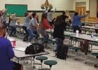 Teachers and staff celebrate last week when the announcement was made that Gramercy Elementary had been named an Apple School of Distinction. School Board Seeks Advanced Insurance Settlement To Pay Incoming Storm Related Bills