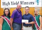 Dr. Al Orgeron presents Remy Lodrigues with the Kermit Coulon, Sr. Scholarship. Pictured from left are Savannah Loupe, Dr. Al Orgeron, Remy Lodrigues and Hannah Roussel. (photo by Sam Irwin) Article Image Alt Text