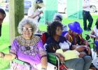 Former Gramercy Alderwoman Rubenstein Clark and others enjoy the Juneteenth Celebration. The event was scheduled to be held at Amato Park in Lutcher but was moved to the Gramercy Town Pavilion due to inclement weather.