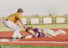 Out at Third: St. James Wildcat Andre Mahler applies the tag to Lutcher Bulldog base runner Gage Berthelot, who was called out trying to steal third base. Photo by Oliver Hooker Out at Third: St. James Wildcat Andre Mahler applies the tag to Lutcher Bulldog base runner Gage Berthelot, who was called out trying to steal third base. Photo by Oliver Hooker