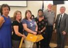 From left: St. James Parish School Board Vice-President Dianne Spencer, District Paraprofessional Dianna Porche (Platinum), District Paraprofessional Morgan Schexnayder (Gold), District Paraprofessional Tremere Freeman (Gold), School Board President Georg Article Image Alt Text