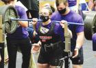 Shay Naquin prepares to squatt during the Bayou Regional Championship meet held at Dutchtown High School on February 26th. LHS’s Naquin And Stafford Will Go Down As Two Of The All-time Best Girls Powerlifters