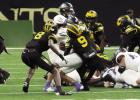 The St. James Wildcat defenders Nolan Zenon (#9) and Caleb Williams (#8) bring down a Sterlington ball carrier in last Thursday’s LHSAA Prep Football Classic Division III (non-select) State Championship game played in the Caesar’s Superdome. The Wildc The St. James Wildcat defenders Nolan Zenon (#9) and Caleb Williams (#8) bring down a Sterlington ball carrier in last Thursday’s LHSAA Prep Football Classic Division III (non-select) State Championship game played in the Caesar’s Superdome. The Wildc
