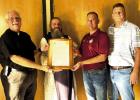 PROCLAMATION - St. James Parish Council Chairman Ryan Louque, second from right, read a proclamation passed by the St. James Parish Council at its last meeting naming August 14th and 15th as Fête Dieu du Mississippi in St. James Parish. Fr. Vincent Dufre Special Resolution For River Blessing