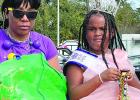 Krewe Of M.A.C. Parade Rolls Through Lutcher And Gramercy On Mardi Gras Day