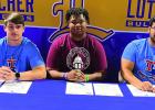 One Footballer, Two Powerlifters Sign College Scholarships