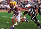 Lutcher Bulldog senior linebacker Tevin Long scoops up a Berwick fumble and takes it in for a touchdown. E.D. White’s Stingy Defense Poised