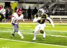 St. James Wildcat defensive back Jye Blain (#7) intercepts the Pine QB and returns the ball 40-yards for a TD. Blain also returned an interception 96-yards for a TD in the previous playoff game against Donaldsonville. Photo by Oliver Hooker St. James Wildcat defensive back Jye Blain (#7) intercepts the Pine QB and returns the ball 40-yards for a TD. Blain also returned an interception 96-yards for a TD in the previous playoff game against Donaldsonville. Photo by Oliver Hooker