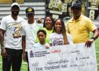 Jarvis Landry presented his yearly Building Winners Foundation Scholarship to Keimani Borne, who recently graduated from Lutcher High. Keimani was presented a $5,000 check, a new TV, a new laptop, and other items to help her navigate her new college life. Back Home! Jarvis Landry Buses Local Youth To Saints Facility For Sixth Annual Giveback Event