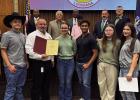 Representatives with the LSU AgCenter and members of the 4-H Youth Development program attended the most recent St. James Council meeting. Here they are taking a photo with Parish President Pete Dufresne and the Parish Council.