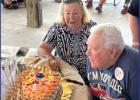 Darlene Bonura, who traveled to Hester from Metairie, coaches the “Birthday Boy” on blowing out the candles on his customized cake baked by Linda Roussel. Bonura’s mother and Nolan’s mother were sisters. What A B-Day! Friends &