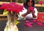 Sabina Miller making wax flowers. Keeping A Tradition Alive: Vacherie Native’s Wax Flowers To Be On Display At Jazz Fest