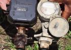 A new automated water meter (left) compared to the old meter previously used by St. James Parish.