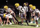 The Lutcher Bulldog defense struggled to get off the field last Friday at St. Charles as the Comets were a perfect 6 of 6 converting on fourth down. Photo by Tony Schexnayder