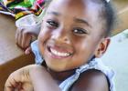 This youngster smiles for the camera during last Friday’s Juneteenth Celebration.