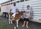 Tad Cavalier and his son Ethan share many special moments together on ET Ranch in Vacherie. Tad holds the three books he wrote. Two books appeal to adults and the third and newest is a wonderful children’s book. If you enjoy books about family, faith an