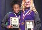 Quamecca Stafford (left) finished in 1st place and broke all four regional records in the 114 lbs. weight class (squat, dead lift, bench press, and total weight lifted). Shay Naquin (right) won 1st place in the 165 lbs. weight class and broke the regional