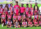 Twenty-six years ago coach Bobby Davis (white shirt) and his brother Craig (not in photo) started the River Parish Hornets youth track team. Over the last 26-years the Davis brothers have coached hundreds of area youth and the program focuses on instillin