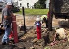 The Town of Lutcher, like many old towns throughout the United States, has an aging water system and Town workers spend a lot of manhours repairing leaks and breaks in the waterlines. Above, workers repair a leak on the corner of Main Street and Texas Str The Town of Lutcher, like many old towns throughout the United States, has an aging water system and Town workers spend a lot of manhours repairing leaks and breaks in the waterlines. Above, workers repair a leak on the corner of Main Street and Texas Str