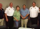 Meeting organizers stand with the St. James Parish Sheriff's Office and Town of Lutcher mayor. From left: David Duhon, Col. Sid Berthelot, Paula Favaloro, Lutcher Mayor Patrick St. Pierre, Capt. Dustin Tomlinson, and Pat Trapagnier. United Front In Lutcher: Lutcher Community And Police