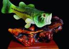 A bass carved by Harry Zeringue. Sisters Turn To Art To Cope With Loss; See Their Work At Special Art Exhibit