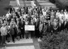 Ronnie Falgoust, President and CEO of First American Bank, and Rose Falgoust, Ronnie’s mother and wife of the late JB Falgoust, present a $1 million check to Nicholls State University. Nicholls State was always near and dear to JB and his legacy will li Nicholls State Receives $1 Million To Dedicate JB Falgoust Department Of Accounting & Finance