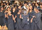 Fantasia is greeted by the young dance group from 6th Ward Elementary. Article Image Alt Text