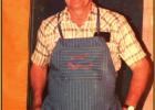 Lloyd “Peanut” Laurent cooking. For many years Laurent would cook a pre-game meal for the Wildcat football team as well as for home and visiting fans. Octave, Laurent Named