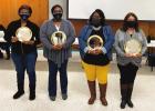 Above are four school District employees who were named Outstanding School Support Employees. The winners were presented an engraved gold plate signifying the distinction. See the article for the names of all the winners and what schools they represent. Principal, Teachers And Support Staff Of The Year Honored; School Board Elects New Officers