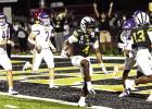 St. James Wildcat receiver Jakias Villanueva (#4) celebrates after scoring a touchdown last Friday. The Wildcats beat the St. Charles Comets 34-28 and Villanueva would also make an unbelievable catch for a touchdown on the last play of the game to put the