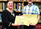 News Examiner-Enterprise writer Pam Folse and Nicholls State University Ellender Memorial Library archivist Clifton Theriot. News Examiner-Enterprise writer Pam Folse and Nicholls State University Ellender Memorial Library archivist Clifton Theriot.