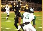 Wildcat defensive back Tyrin Bastian (#29) picks off a pass during last Friday’s first round playoff win over the Mansfield Wolverines. The Wildcats won 28-0 and will now travel to Shreveport this Friday to face Green Oaks. Photo by Oliver Hooker