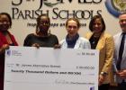 Representatives with United Healthcare present a $20,000 check to the St. James Parish School District. The funds will be used to create a “Reset Room” at the Magnolia Academic Center of Excellence.