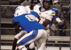 St. James Wildcat senior receiver Trenton Ester breaks a tackle for a 12-yard gain during last Friday’s “Railroad Classic” against the West St. John Rams. The Wildcats dominated from start to finish as they shut out the Rams 61-0. Photo by St. James Wildcats Derail Rams In Railroad Classic